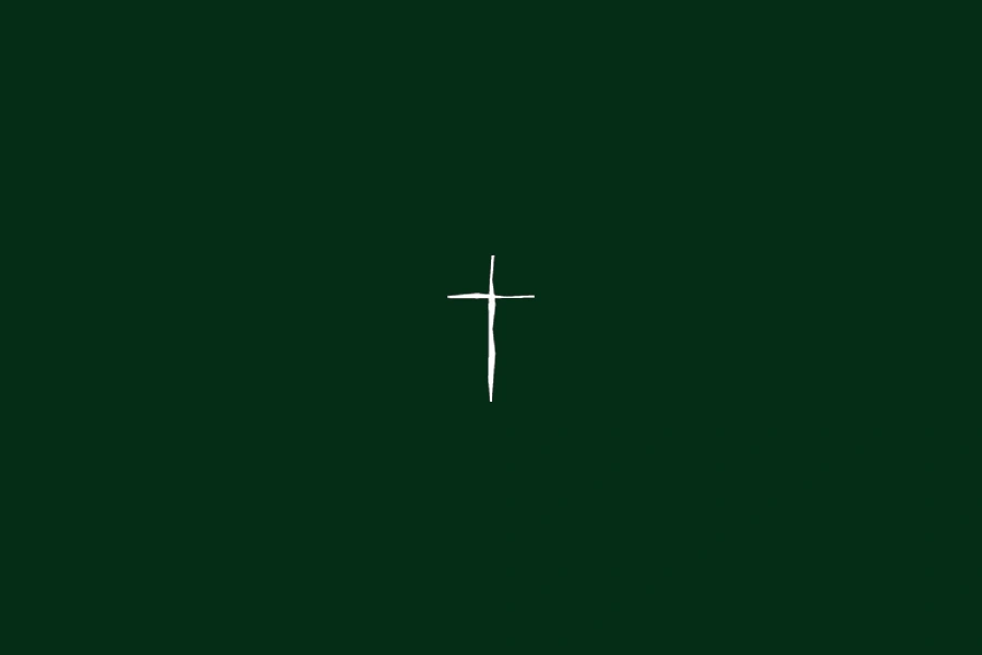A cross on a green background
